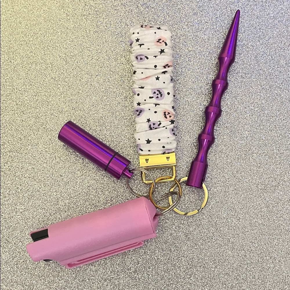 NWOT Purple and Pink Pumpkin Safety Keychain Set